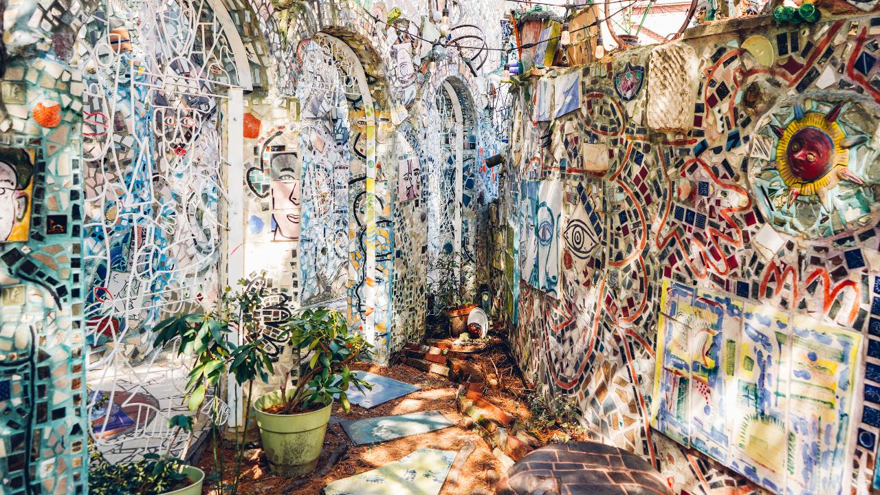 Magic GardensVisitors can immerse themselves in a glittering garden of mosaics at Philadelphia’s Magic Gardens on South Street that celebrate creativity and storytelling through a unique perspective on art. This three-block museum/installation is a mesmerising maze covered with mosaics. Half indoor and half outdoor, this unique space is not your typical garden. The space is filled with unexpected items, including mirrors, bottles, and bicycle wheels, all held together by colourful grout. Fully out of the ordinary, this folk-art labyrinth is the largest work to date by mosaic artist Isaiah Zagar. Explore the surrounding streets as well, to see where Zagar’s unique mosaics have “spilled out” into the surrounding neighbourhood