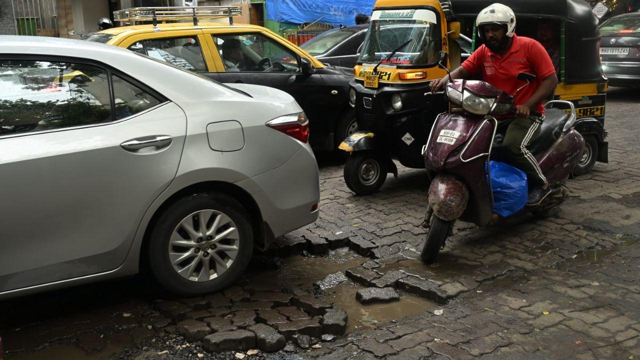 In Photos: Mumbai`s pothole woes continue