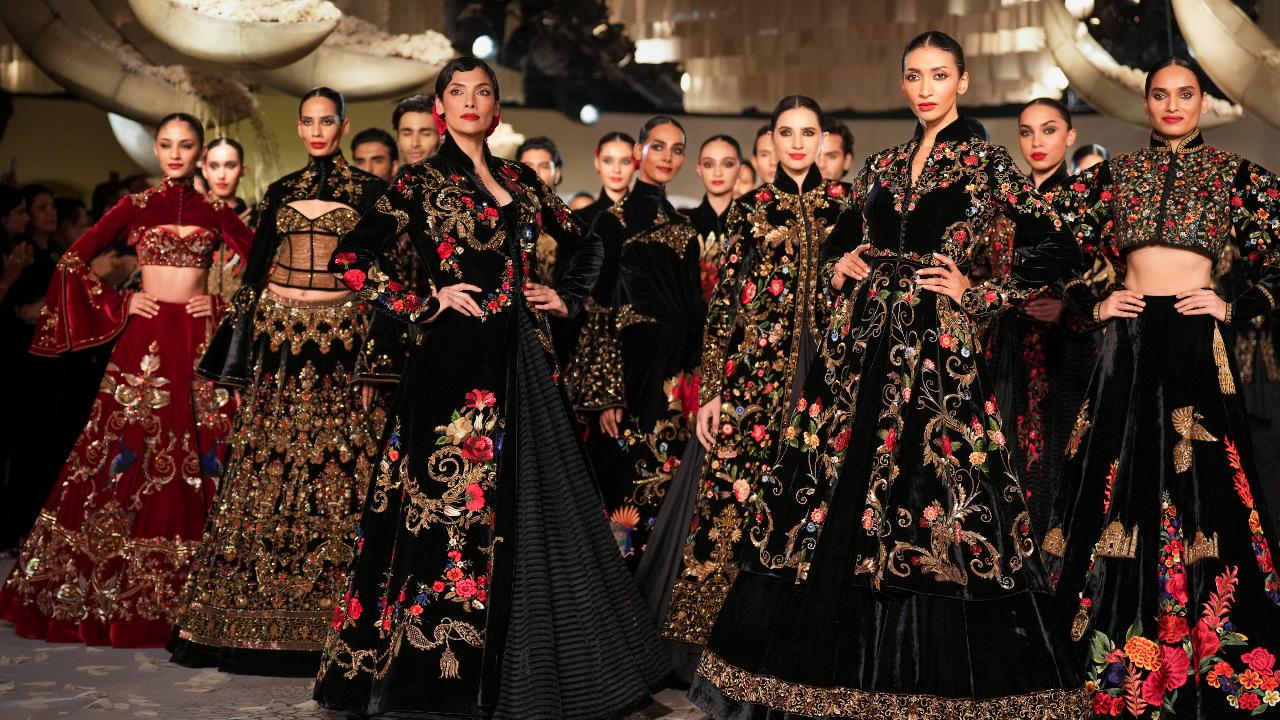 Models present creations by Rohit Bal at India Couture Week 2025