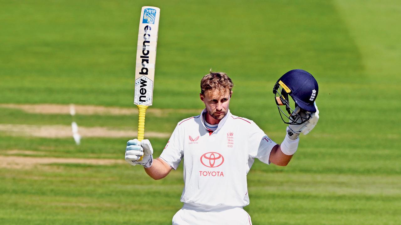 England’s Joe Root celebrates his century yesterday. PIC/BIPIN PATEL