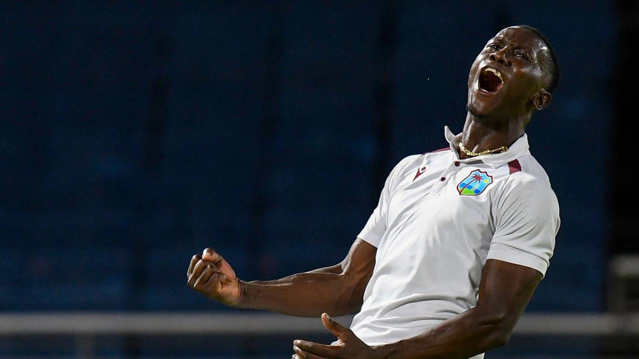 West Indies take honors on 1st day of day-night 3rd test against Australia