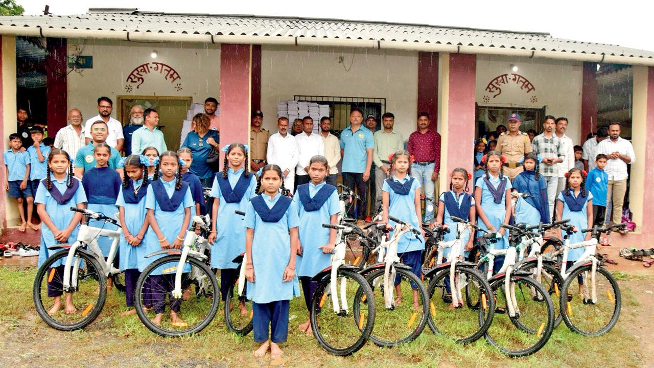 The tribal girls of Talasari with their bikes 