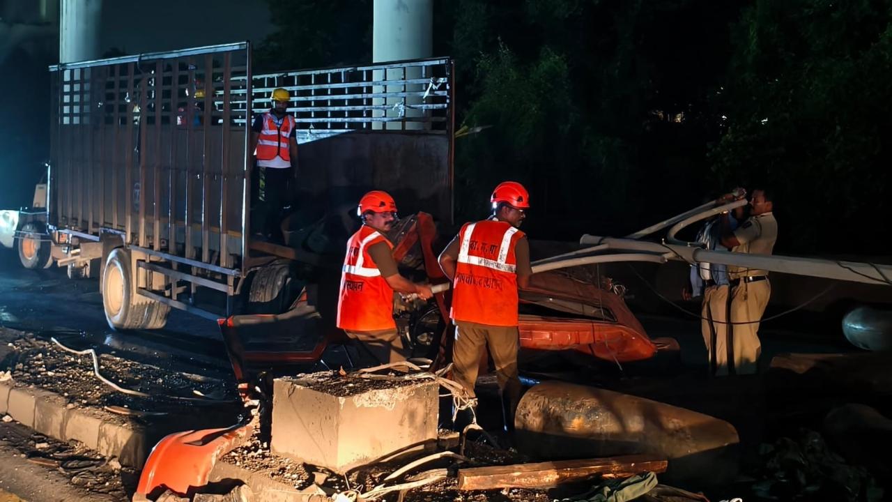 The accident left iron rods and pipes, weighing nearly 8 tons, scattered across the road and oil from the damaged vehicle also spilled on the route, blocking traffic in both directions