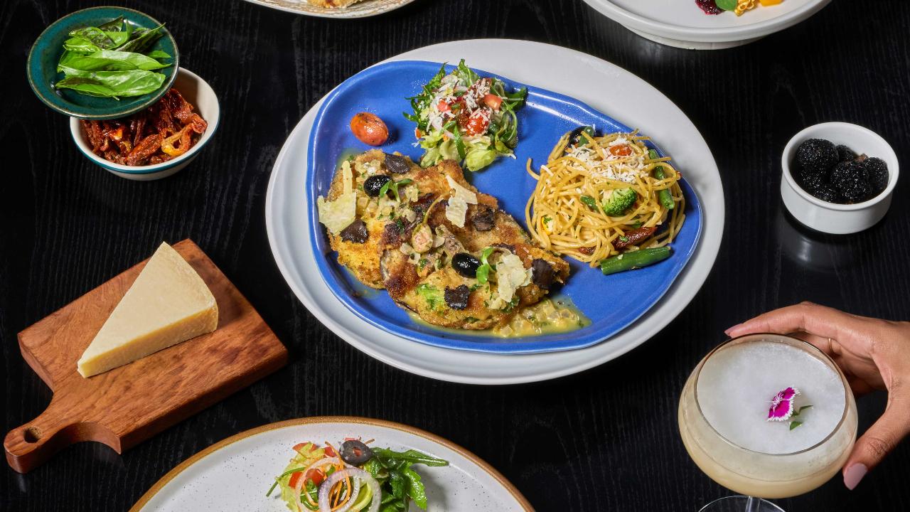 Italian fiestaTo feed your rainy day cravings, indulge in delicious Italian cuisine during the weekends in July. Savour Scaloppine All’Italiana, Scaloppine di melanzane e zucchine, Scaloppine di pollo al limone vino bianco, Scaloppine di pollo con balsamico e scalogno, Scaloppine di pollo alla pizzaiola, Scaloppine di pollo in salsa di salvia e burro di nocciole, and Scaloppine di pollo alla boscaiola. 
End your meal on a sweet note with Cocoa berry chocolate & lemon infused truffle cake or the Linzer berry popcorn cake, but not without indulging in the 'Twists on the Negroni' menu. Sip on bold Negroni classic to the floral Negroni segreto or the Hazelnut negroni, and the sparkling, citrusy Negroni spagliato. If you want healthy mocktails, then try the ange splash with citrus and basil, Green bliss with cucumber and kiwi, Watermelon mirage with beetroot and guava, or brews such as the Classic mint lemonade and Strawberry matcha.
Where: Toscano, across all outlets Time: 11 am - 11:30 pm