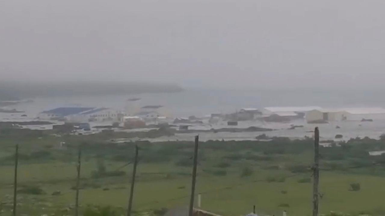 The quake at 8:25 a.m. Japan time had a preliminary magnitude of 8.0, Japan and US seismologists said. The US Geological Survey later updated its measurement to 8.8 magnitude and the USGS said the quake occurred at a depth of 20.7 kilometers