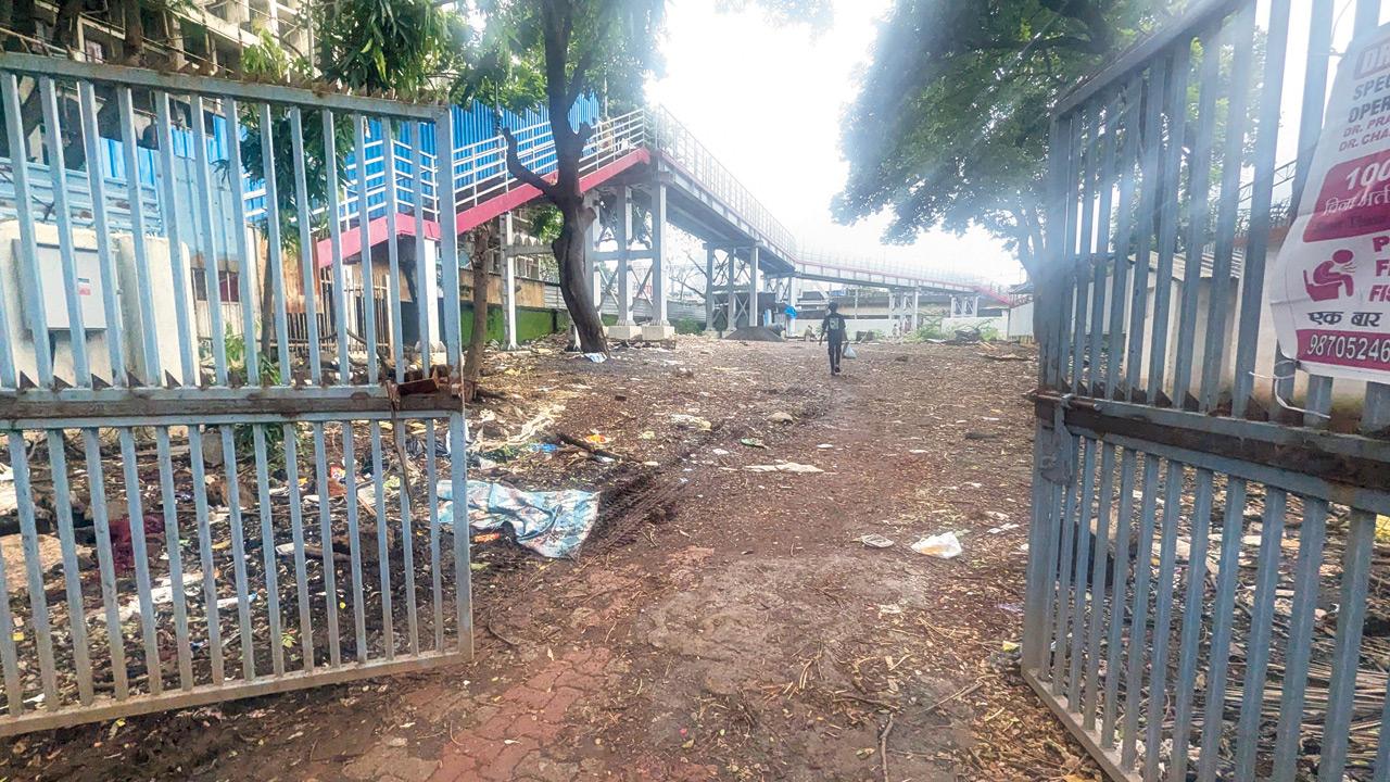 Gaping access gates next to the unused Wadala foot overbridge