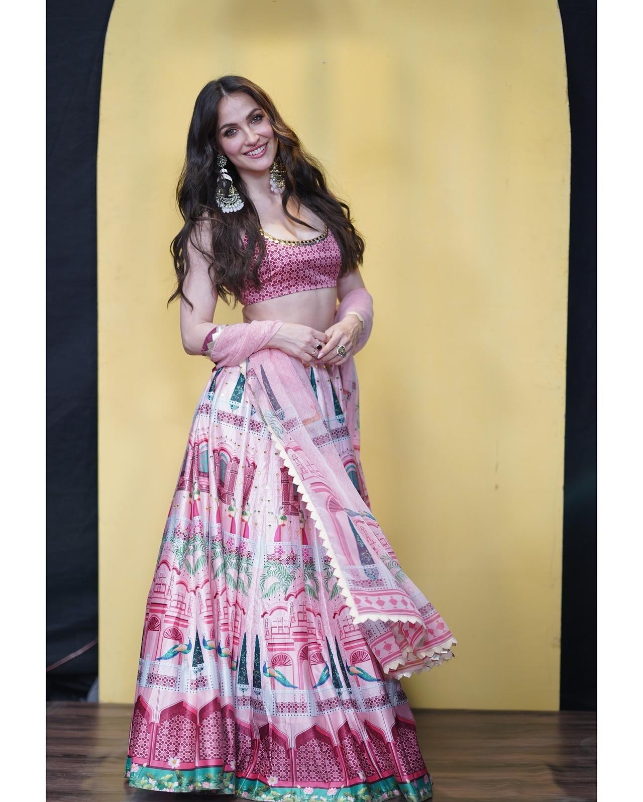 Chanelling the bridesmaid vibe, this pink lehenga is all things traditional, fun and quirky, yet effortlessly beautiful.
