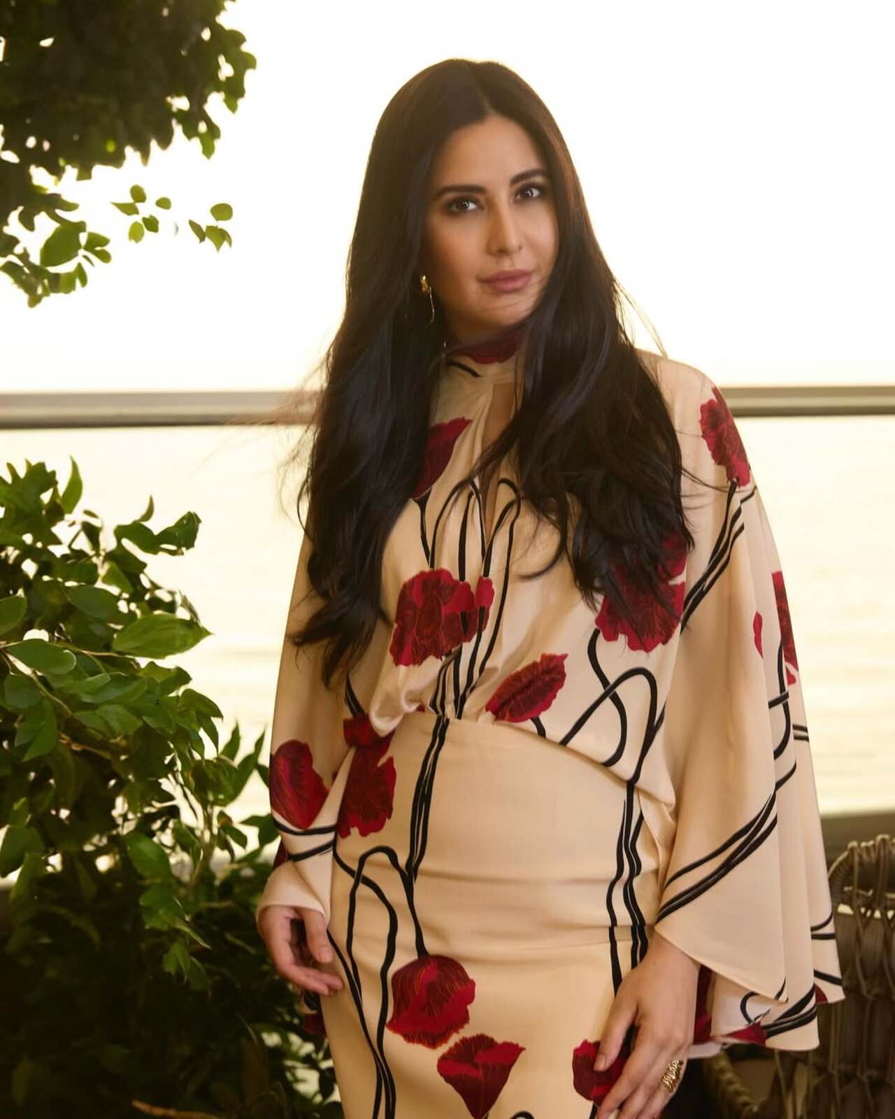 Katrina often picks floral prints that aren't commonly found. The actress went for a floral dress for the day out. Keeping the makeup natural, Kaif focuses on accentuating the outfit over hair and makeup