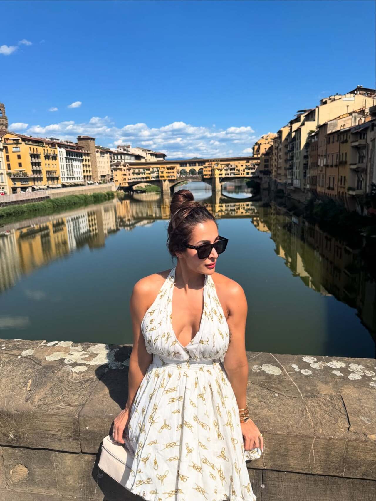 All things chic and stunning with her halter dress 