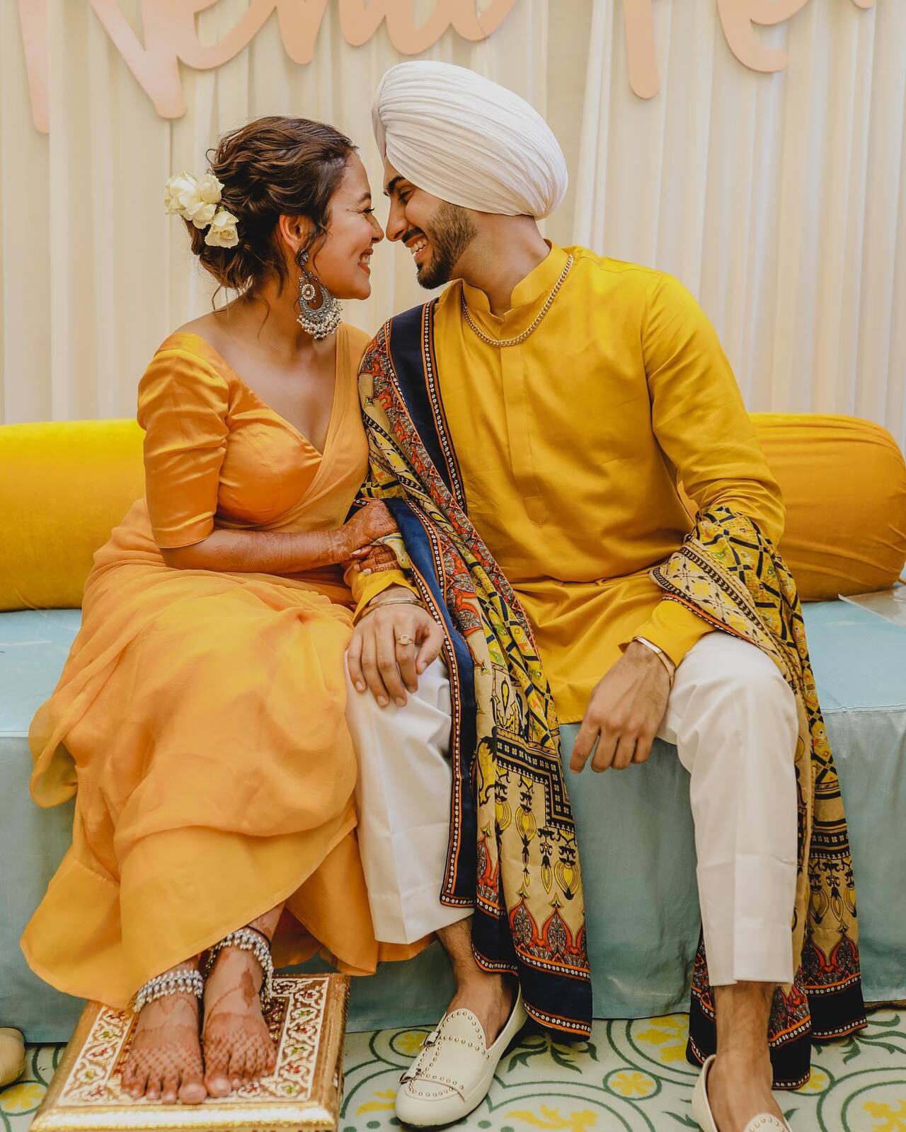 Marriage moments are always magical. Neha and Rohanpreet looked truly smitten during their haldi ceremony, twinning in vibrant yellow traditional outfits