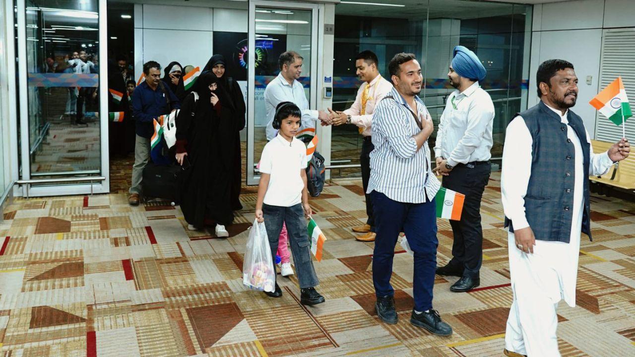 A special flight carrying 272 Indian nationals and three Nepalese citizens stranded in conflict-hit Iran's Mashhad landed safely in New Delhi on Thursday. (Pics/PTI)