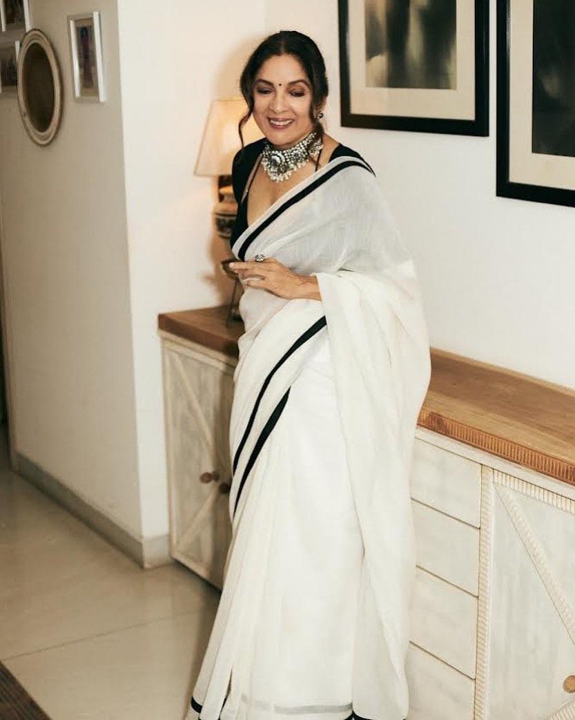This fusion saree is just too beautiful, and Neena totally aces the monochromatic look. The way she pulls off the modern ethnic saree and blouse at 66 can give the younger actress a run for their money. 