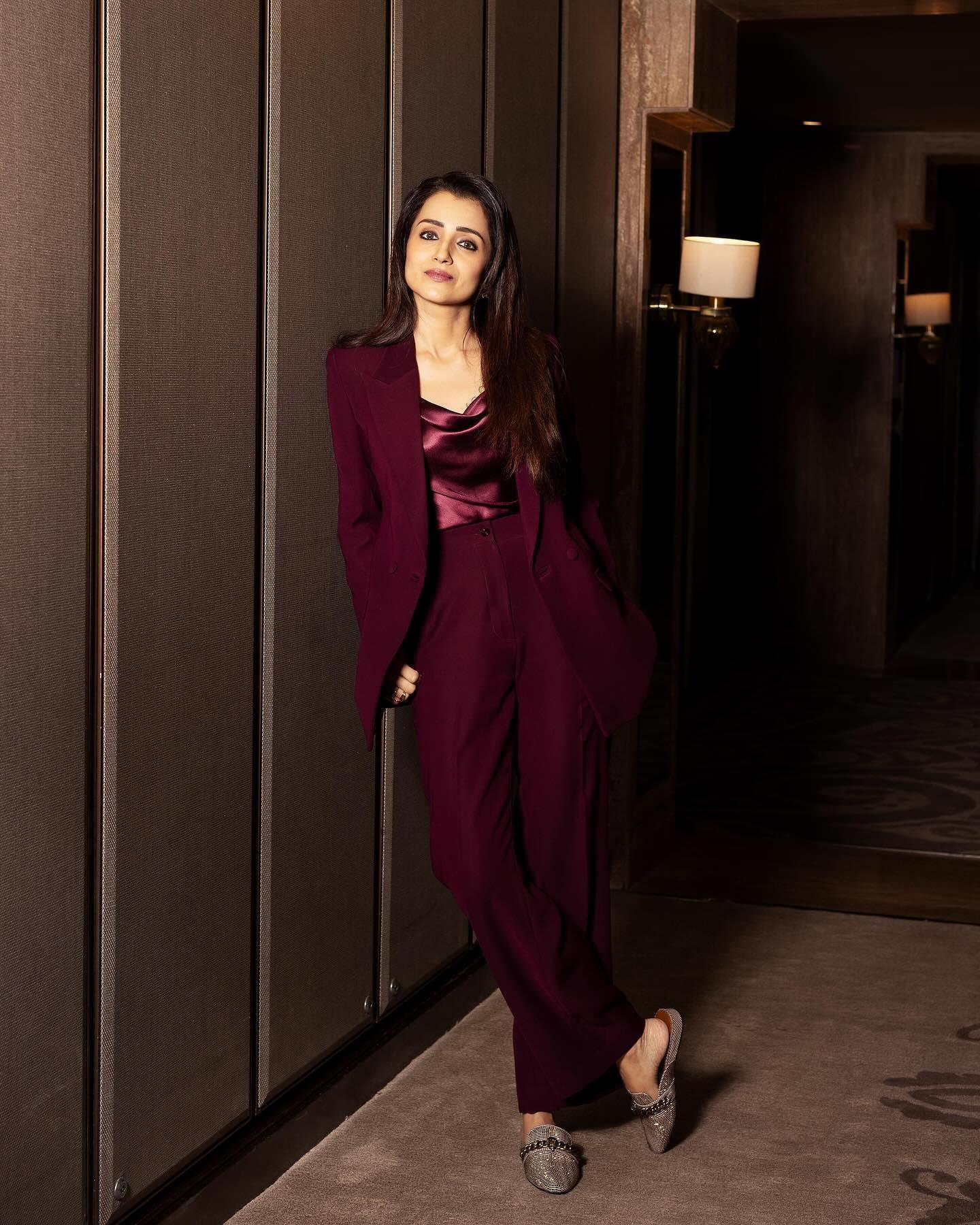 Finally, this maroon pantsuit screams 'Boss Lady'. The satin top underneath the coat added just the right about of glam to this look.