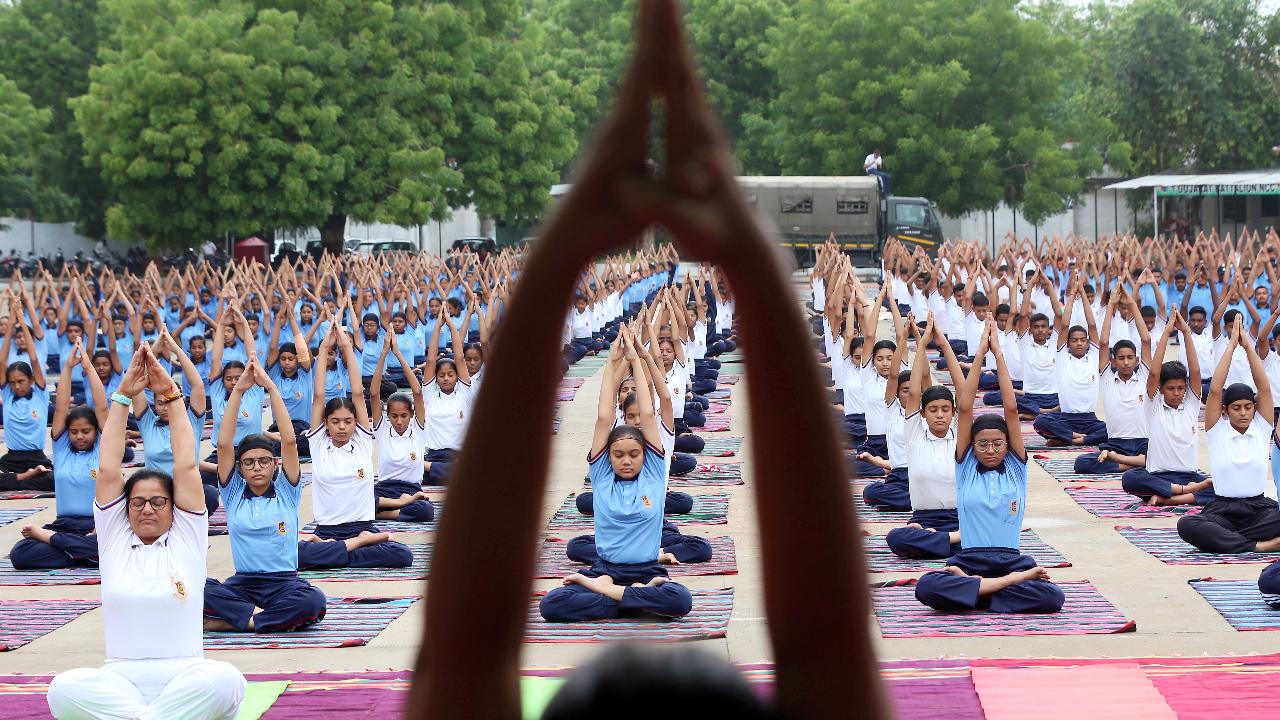 National Cadet Corps (NCC) cadets practice yoga ahead at NCC headquarters in Ahmedabad, Gujarat
The day brings people together to celebrate yoga and promote a healthy lifestyle