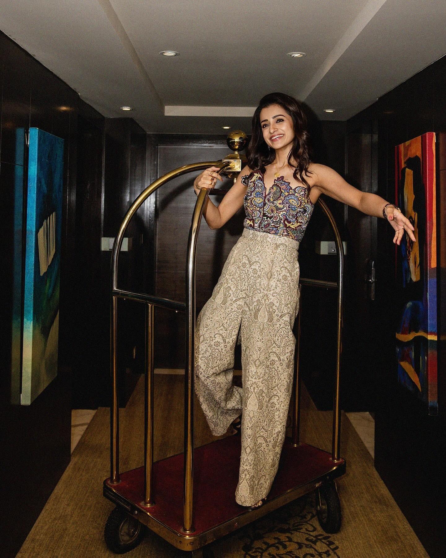 Trisha looked stylish and gorgeous in this comfy look. It featured printed beige pants with a colourful printed sleeveless top. The look was formal yet fun, and is worth a steal.