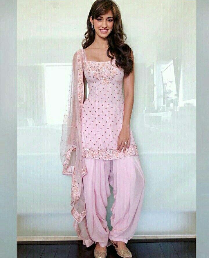 If she can look sensual in a saree, she can rock in a patiala suit too. One of our most favourite looks, we love how the suit perfectly complements her body and height. The hairstyle adds a layer of cuteness. 