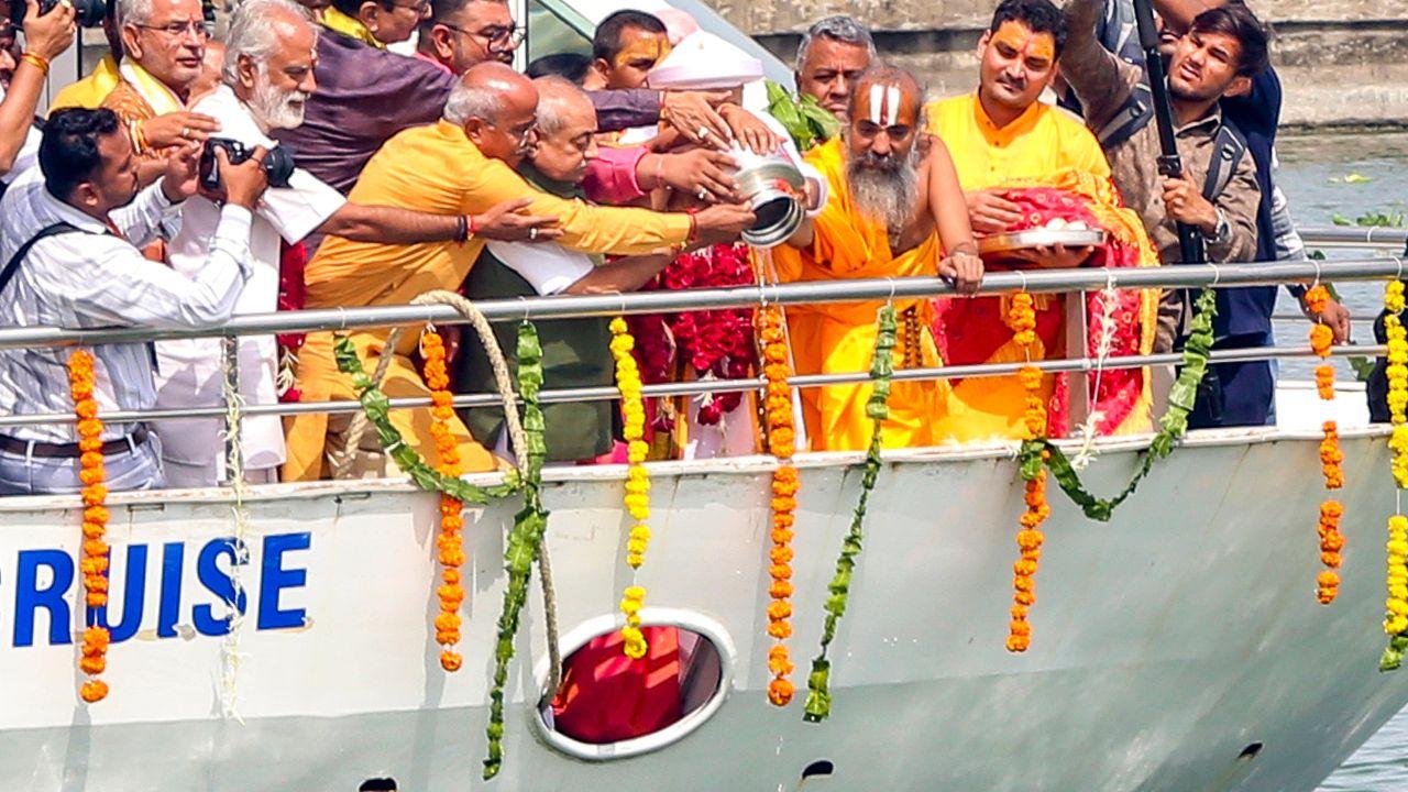 Amid chanting of Vedic mantras, altogether 108 pitchers of 'sacred water' from the 'Sunakua' (golden well), located on the temple premises, were poured on the idols around 12.20 pm on Wednesday.