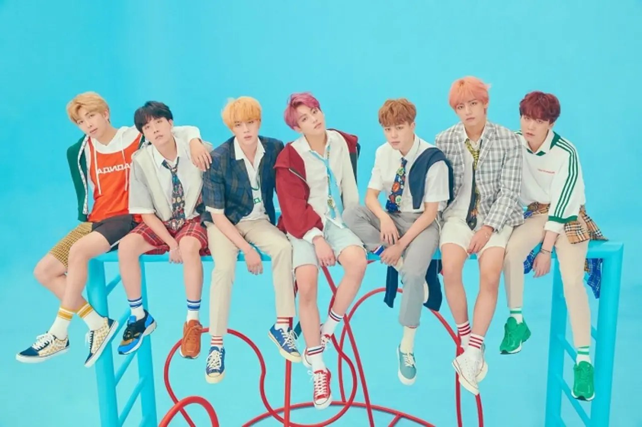 “IDOL” is a high-energy anthem by BTS that celebrates self-love and individuality. Blending traditional Korean sounds with modern beats, the song boldly declares that no one can define who they are