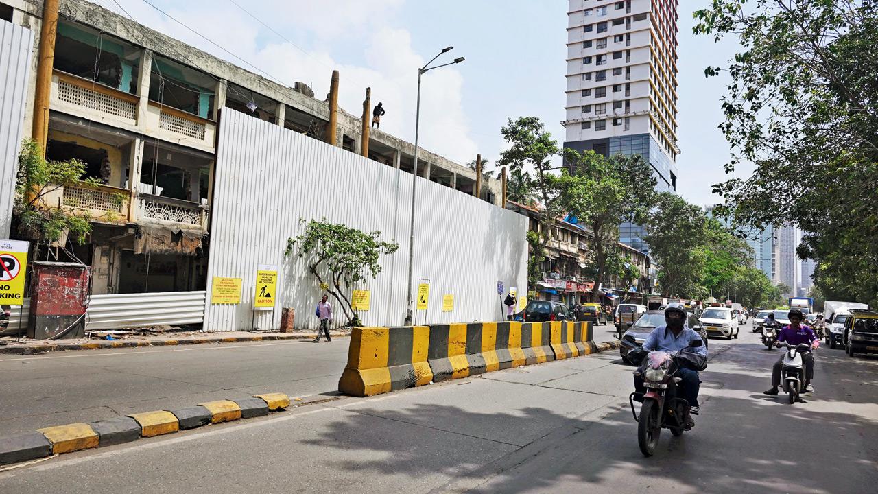 The divider opposite the main gate of Dadar’s Kohinoor Technical Institute where multiple gaps have been filled. Pics/Ashish Raje