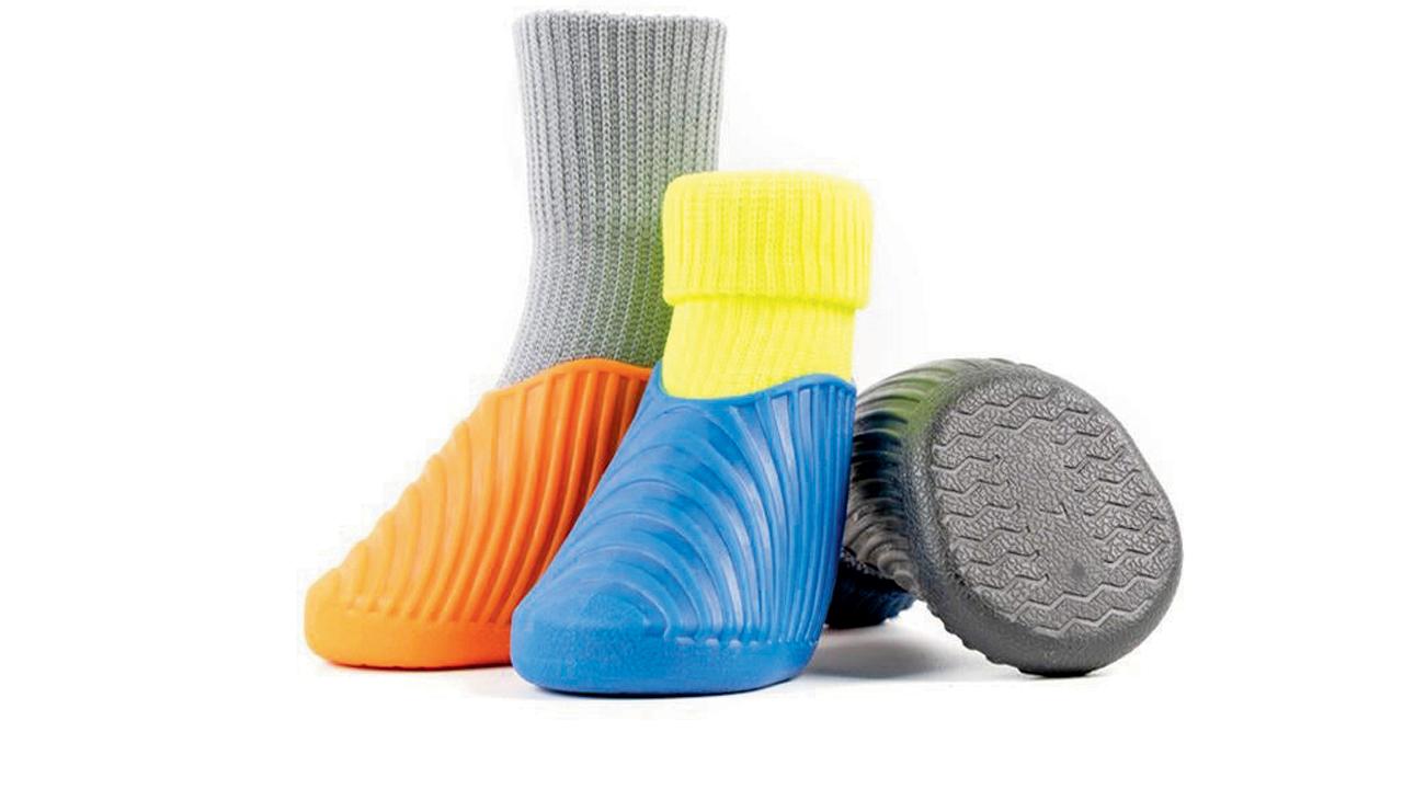 The booties are like a sock encased by a rubber shoe. Pics courtesy/Pawsmo.in