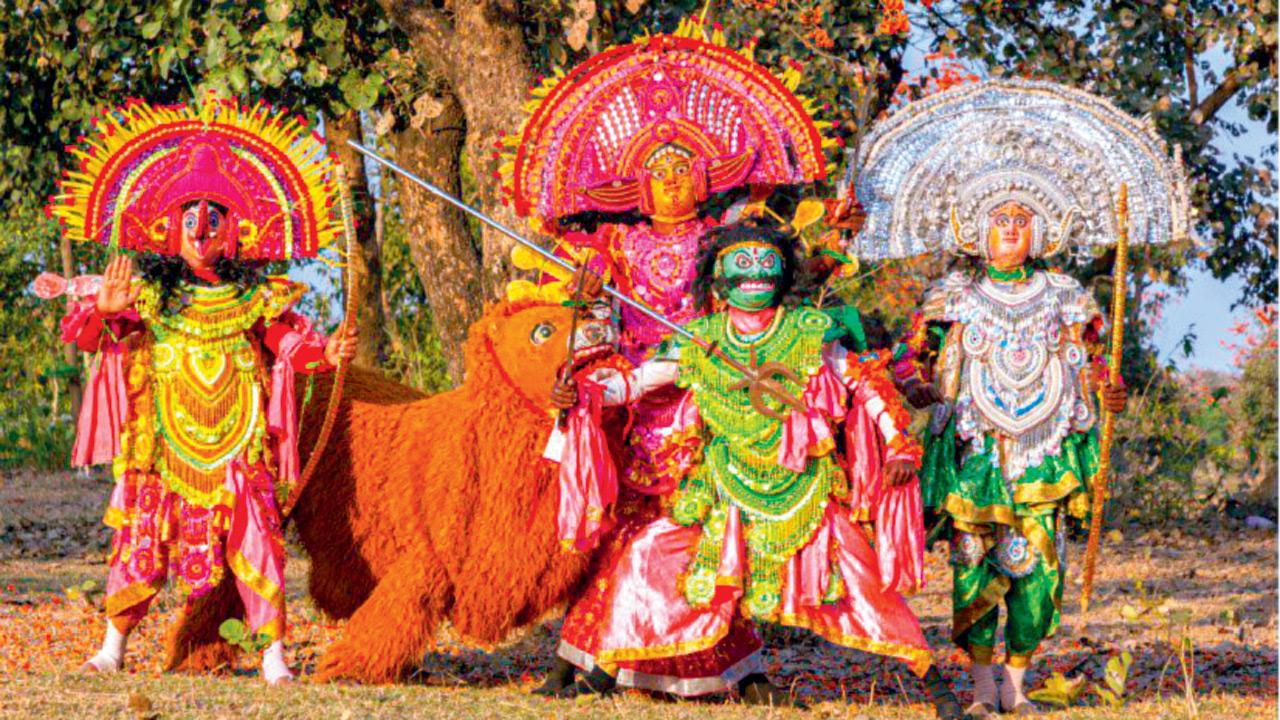 A troupe poses in full costume before a show