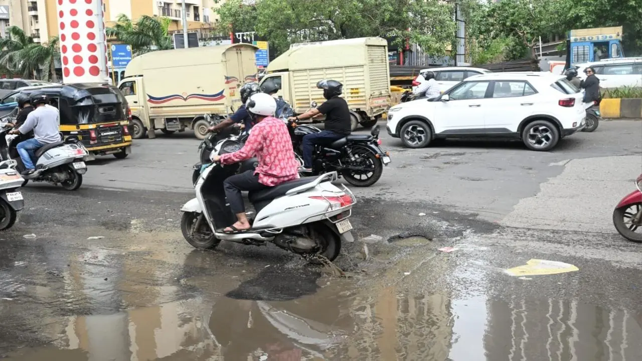 IN PHOTOS No respite from potholes on Mumbai roads despite BMC s promises