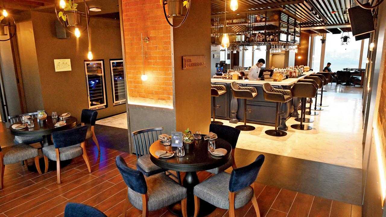 Curated lighting and alcoves create different zones in the bar