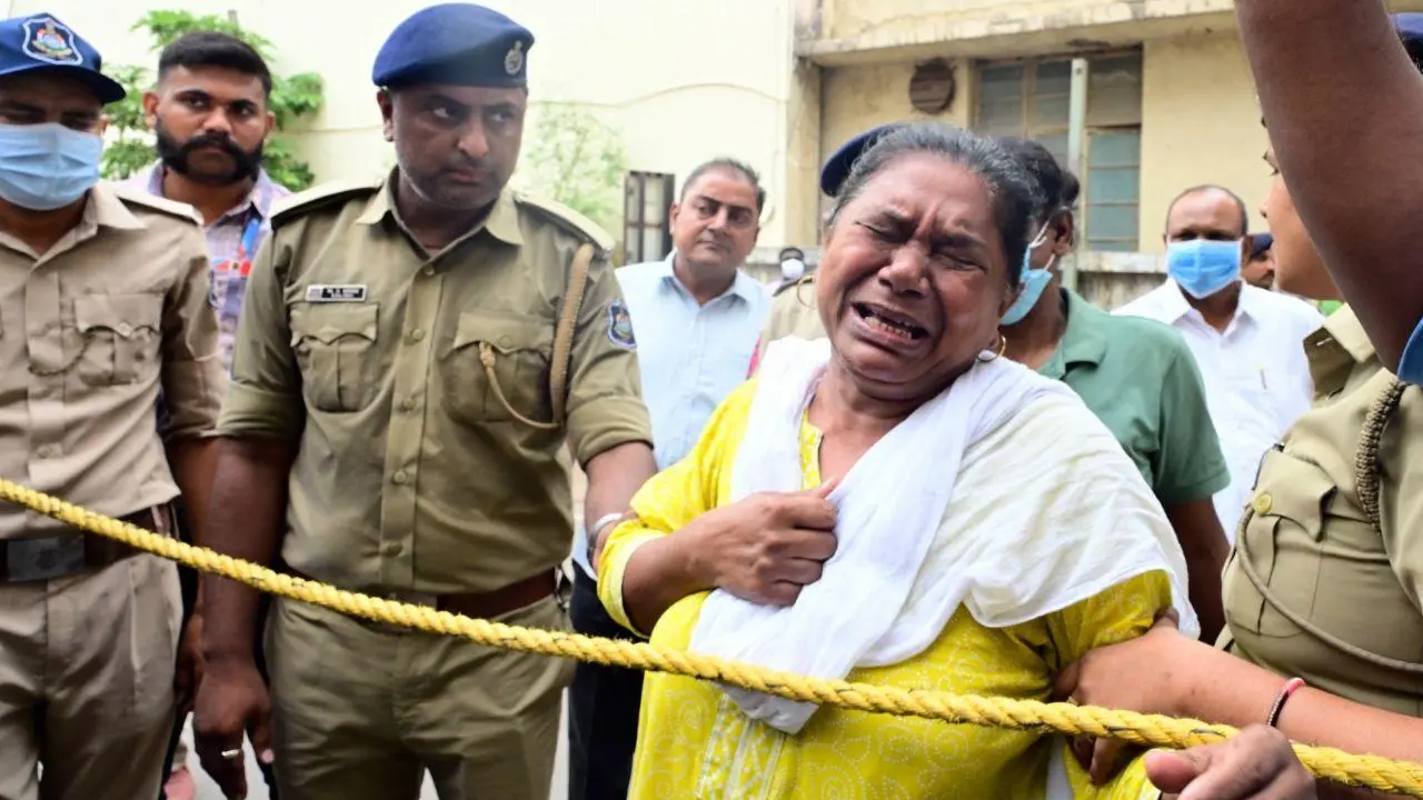 IN PICS: Grieving families of plane crash victims arrive at Ahmedabad hospital