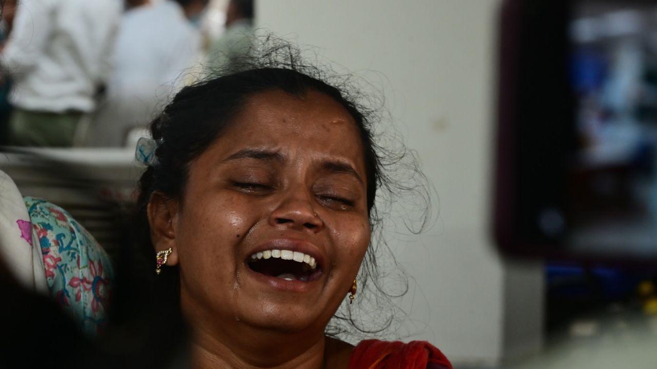 Devastation and sorrow: A woman mourns the loss of a loved one