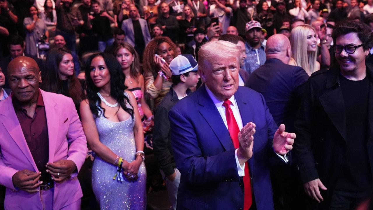 Trump shook hands with the UFC broadcast team that included Joe Rogan 
