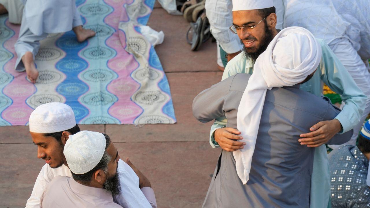 People greet one another after offering namaz on the occasion of Eid al-Adha at Jama Masjid in New Delhi
Eid al-Adha is marked by special prayers, feasting, and the ritual sacrifice of animals such as goats or sheep. The meat is distributed to family, friends, and those in need