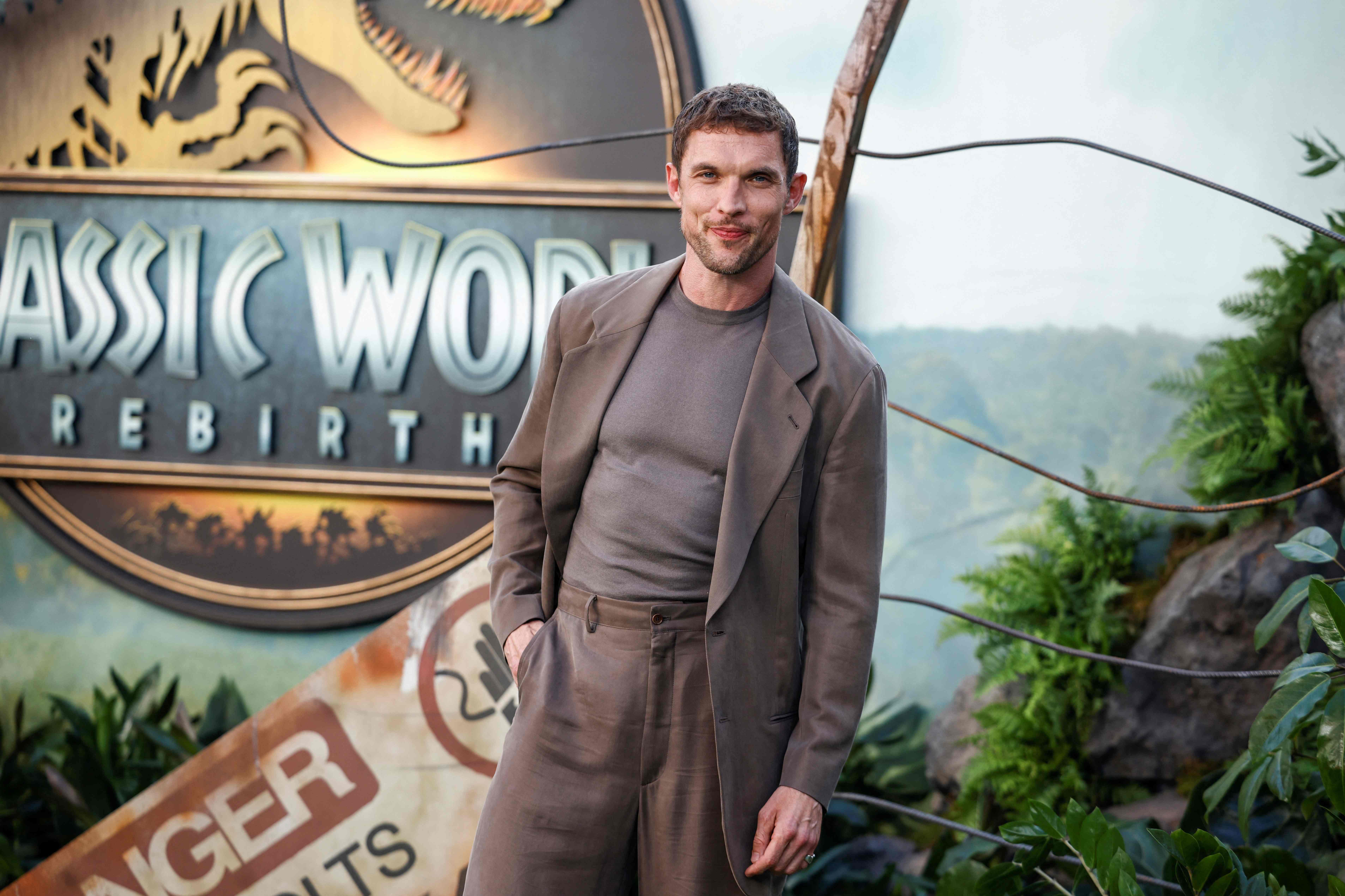 Ed Skrein
Ed Skrein skipped the classic suit, opting for a brown blazer over a grey tee—chill, sharp, and on theme. He plays Bobby Atwater, part of Zora’s extraction team