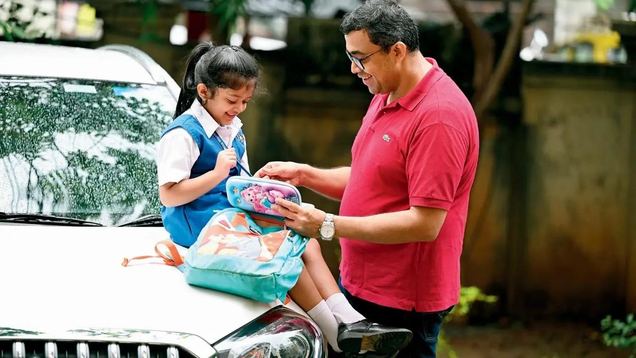 While fathers are known to be tough they also showcase their love in the little things they do for you daily, like this father during school-time in Sion. Pic/Kirti Surve Parade