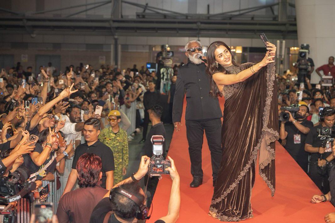 She also wore a black velvet saree with a halter neck embellished blouse. The saree was a perfect party-wear steal.