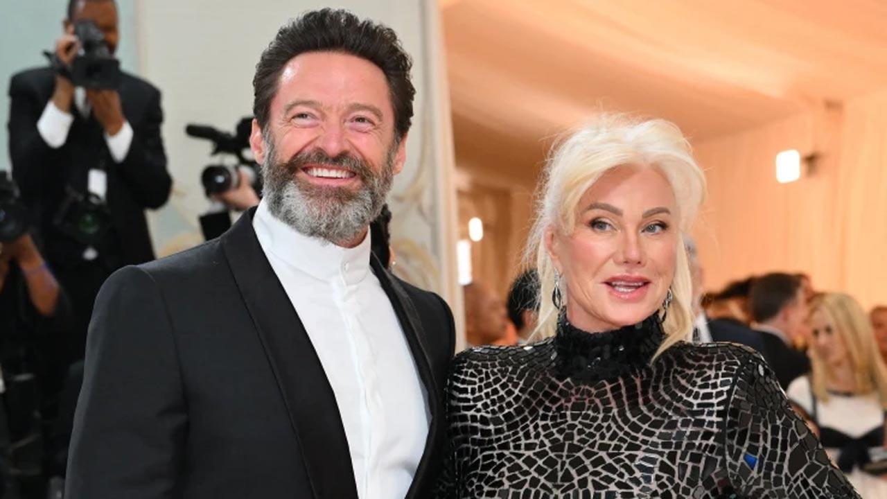Hugh Jackman with estranged wife Deborra-Lee Furness. Pic/AFP