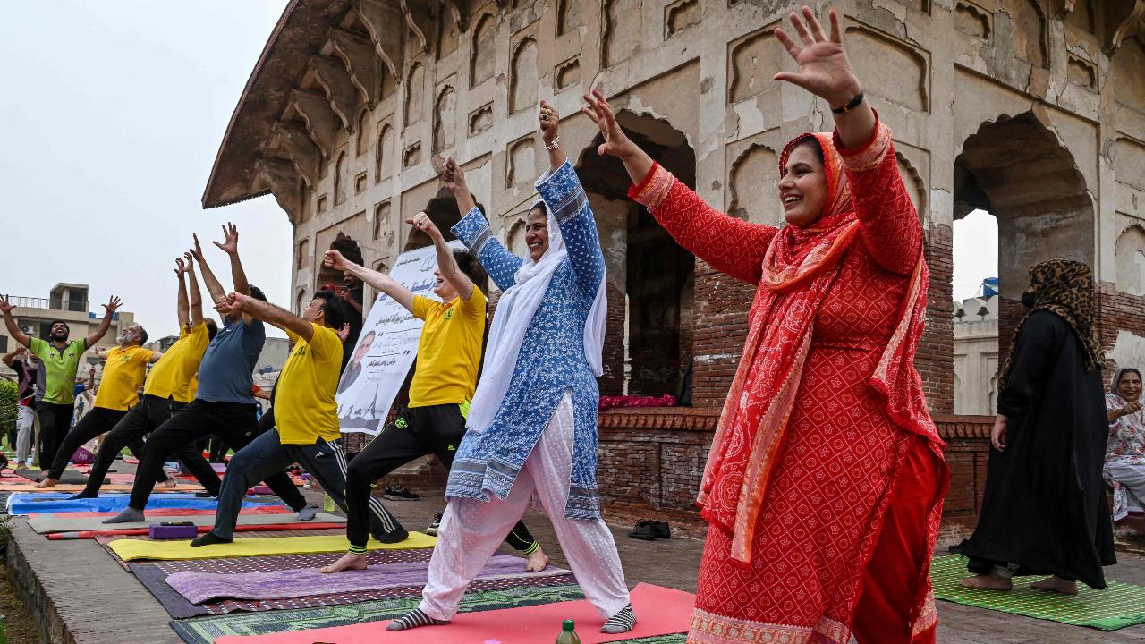 Muslim women take part in a yoga session to mark the International Day of Yoga in Lahore on June 21