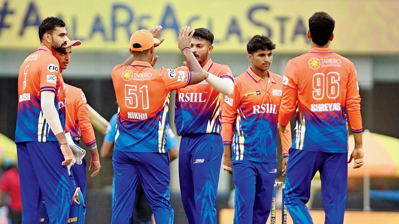 Sobo Mumbai Falcons players celebrate a North Mumbai Panthers wicket yesterday