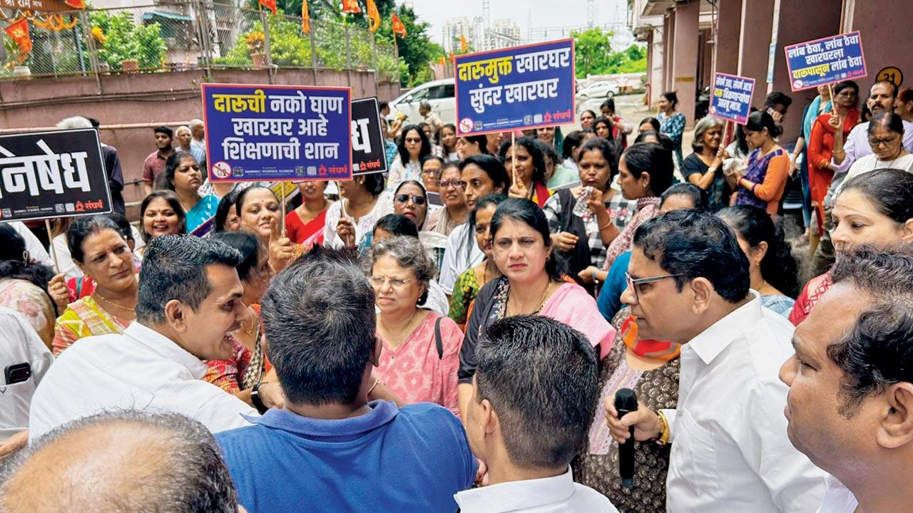 Locals stage a protest against liquor sale yesterday. Pics/Leena Garad 