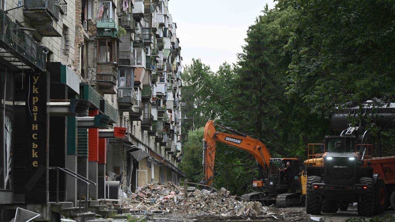Zelenskyy, along with the head of the presidential office, Andrii Yermak, and Interior Minister Ihor Klymenko, visited the site of the apartment building in Kyiv's Solomianskyi district on Thursday morning, laying flowers and paying tribute to the 23 people who died there after a direct hit by a missile brought down the structure