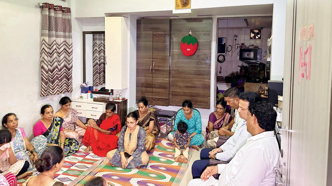 The family of Maithili gather at her home in Panvel on Friday after hearing about the tragedy