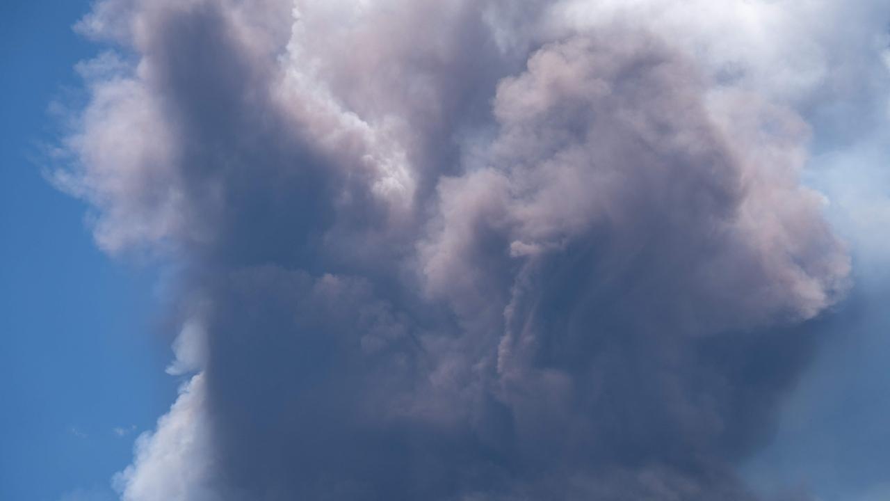 Italy's INGV National Institute of Geophysics and Volcanology said the spectacle on Europe's most active volcano was caused when part of the southeast crater collapsed, resulting in hot lava flows. It was the 14th eruptive phase in recent months