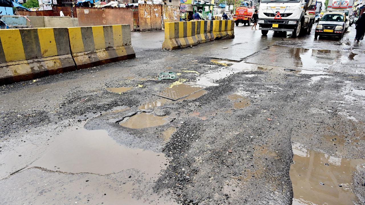 A pockmarked Sixty Feet Road in Dharavi after first heavy rainfall. Pic/Shadab Khan