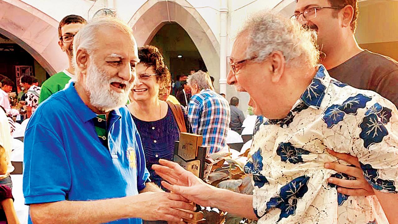 Receiving the lifetime achievement award from Nitin Dossa for his contribution to the city’s vintage and classic car aficionados’ fraternity. PICS COURTESY FRAM DHONDY