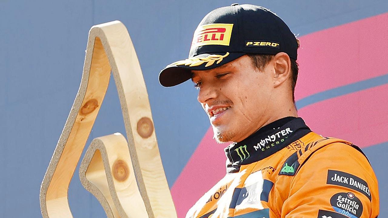 Norris holds off Piastri to win as Verstappen crashes out