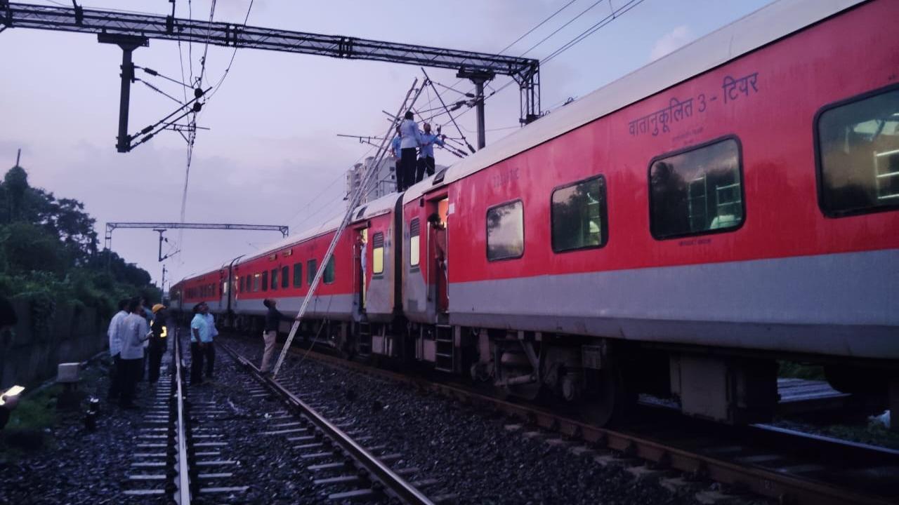IN PHOTOS: Train services hit after overhead wire snag near Palghar station