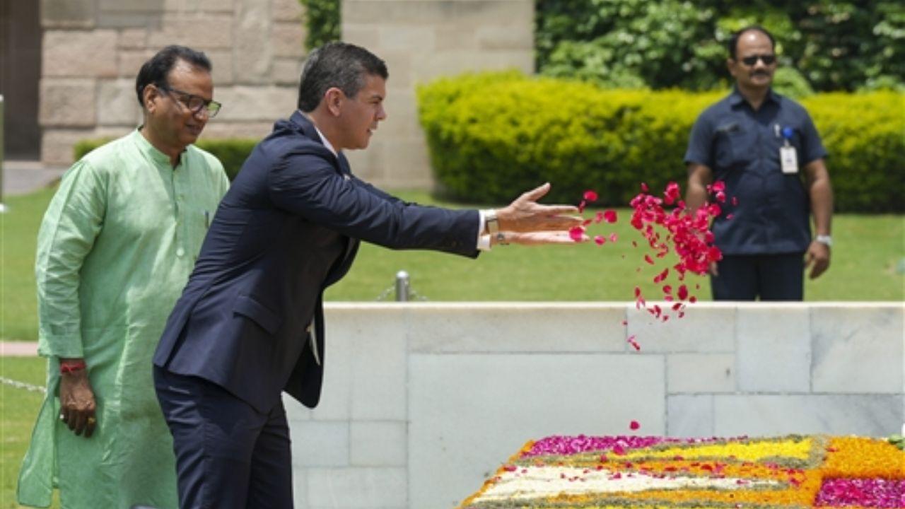On Monday, President Santiago Pena paid tribute to Mahatma Gandhi by laying a wreath at his memorial in Rajghat. The moment was shared by the Ministry of External Affairs on social media, highlighting the significance of the gesture in honoring Gandhi's legacy of peace and non-violence