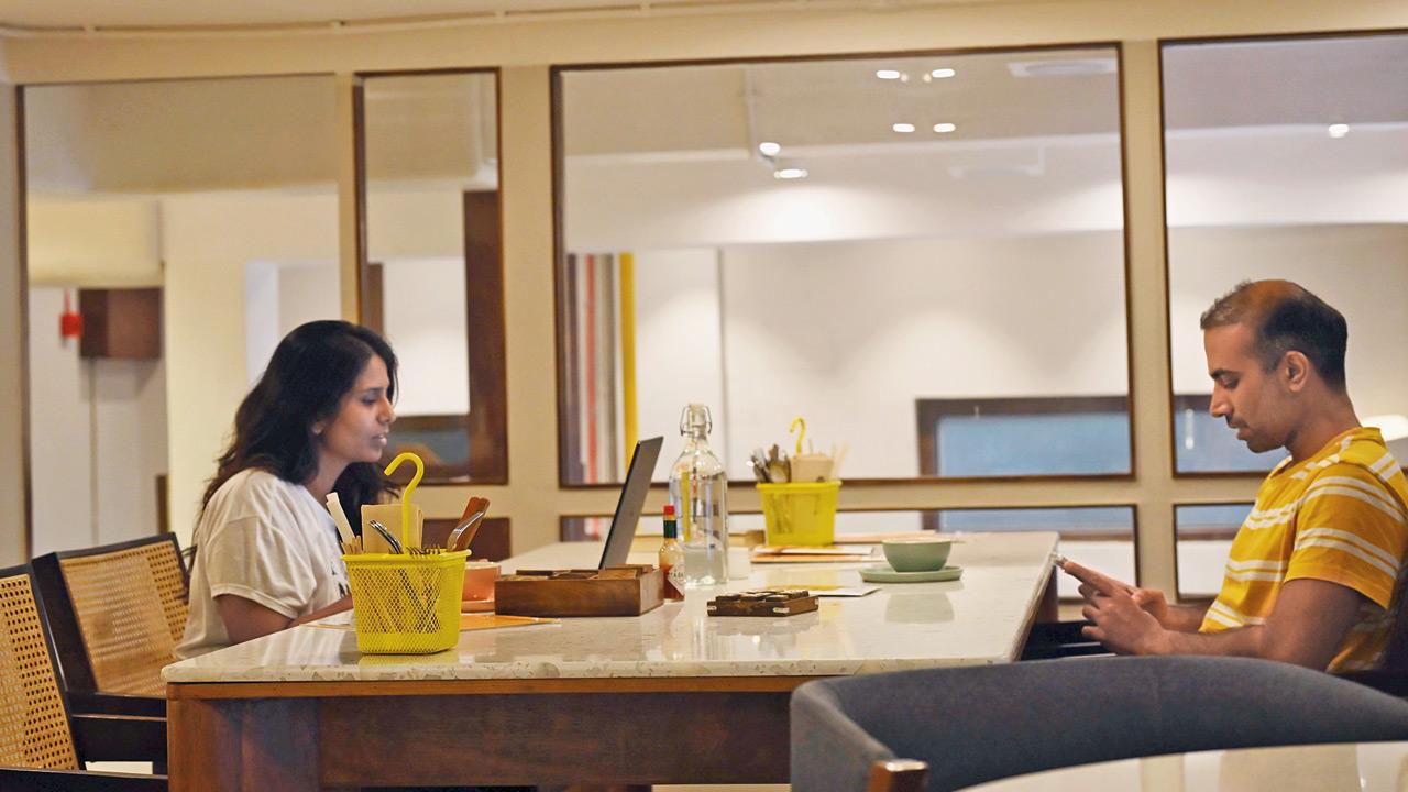 Patrons work at the Worli café. Pic/Ashish Raje