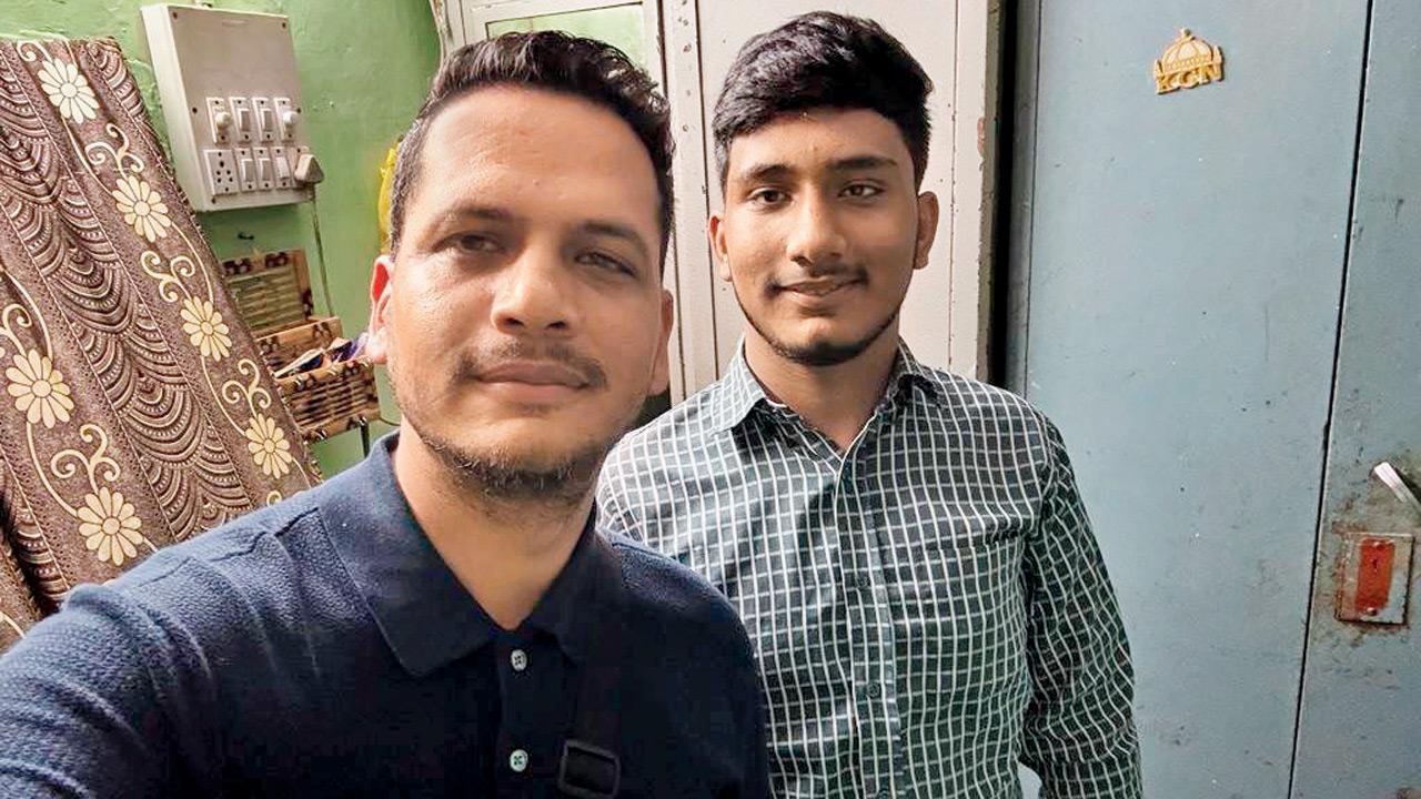 Rafiq Abul Memon with his cousin Saood Memon (right)