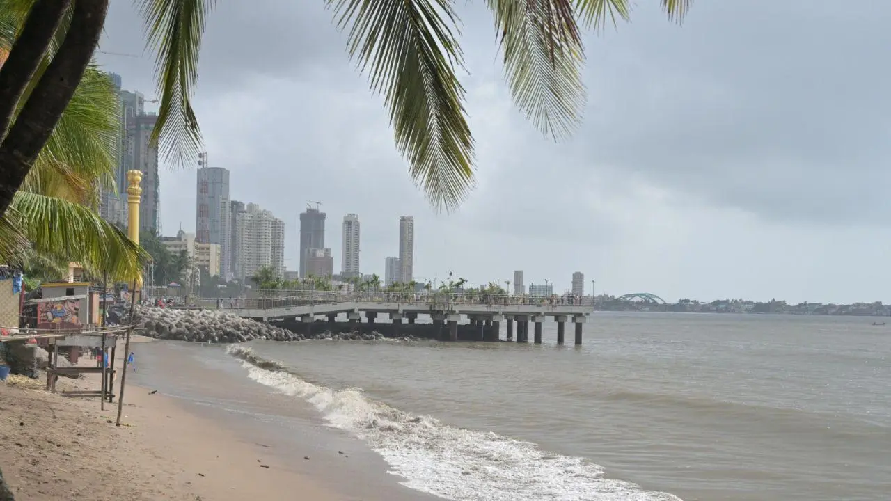 IN PHOTOS: Dark clouds hover over Mumbai’s skyline as city witnesses light rains