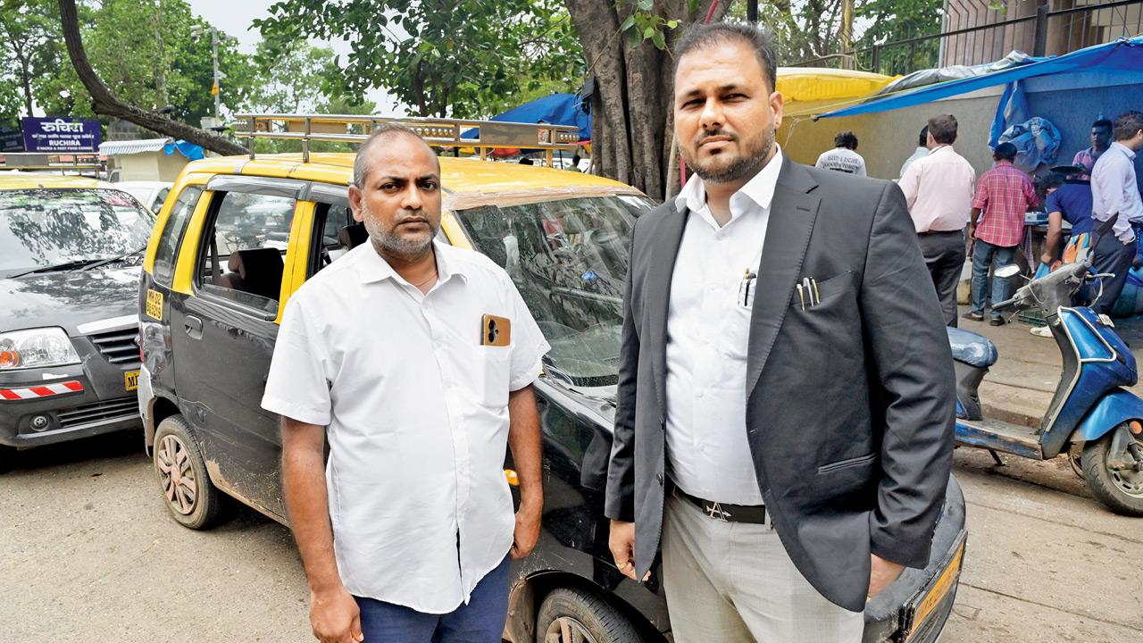 Colaba resident Rajesh Yadav and Advocate Sunil Pandey (right) outside the Esplanade Court in Fort yesterday. Pic/Sayyed Sameer Abedi